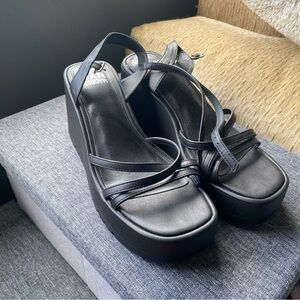 Sleek Black Platform Shoes with Adjustable Straps